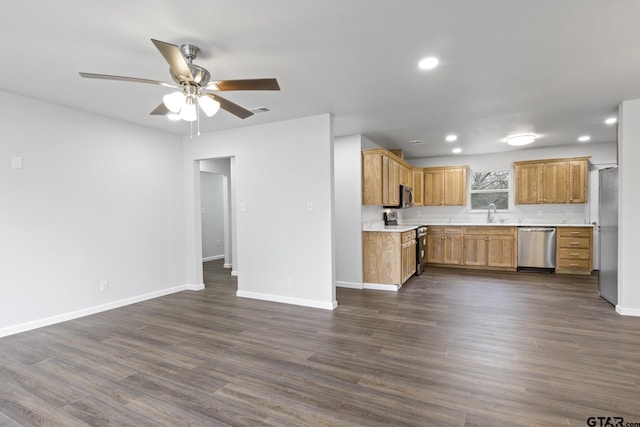 kitchen with baseboards, visible vents, appliances with stainless steel finishes, dark wood-style flooring, and light countertops