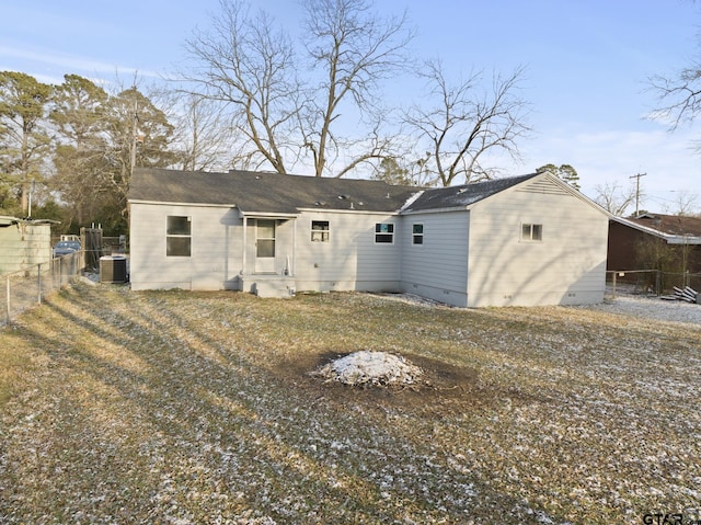 back of house featuring crawl space, fence, and central AC