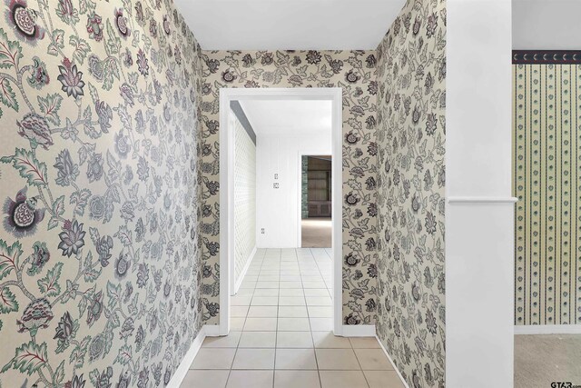 507 Tullie Dr, Longview, TX 75601 - bathroom featuring wallpapered walls, tile patterned flooring, and baseboards
