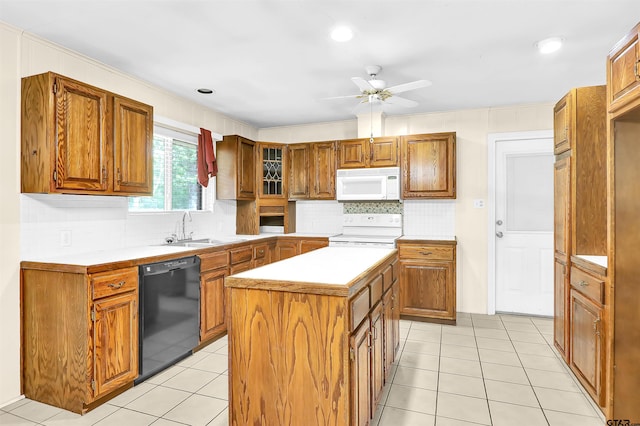 507 Tullie Dr, Longview, TX 75601 - kitchen featuring white appliances and brown cabinetry