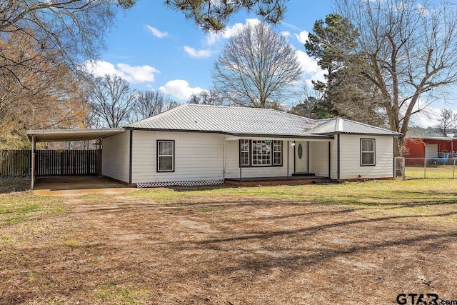 single story home with a carport and a front yard