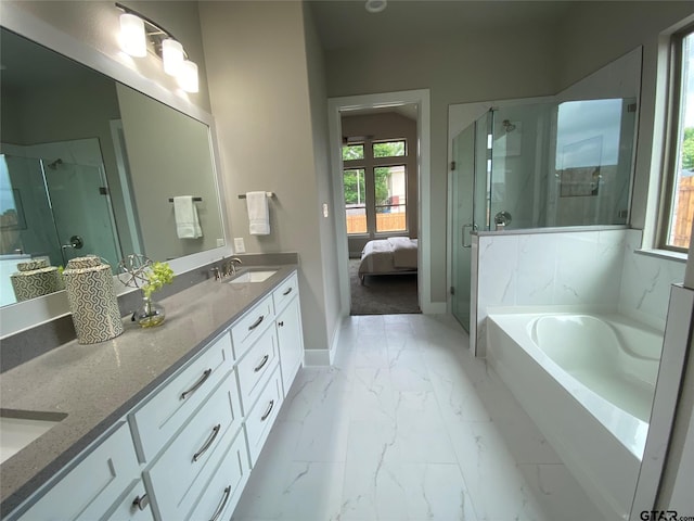 bathroom with plus walk in shower and vanity