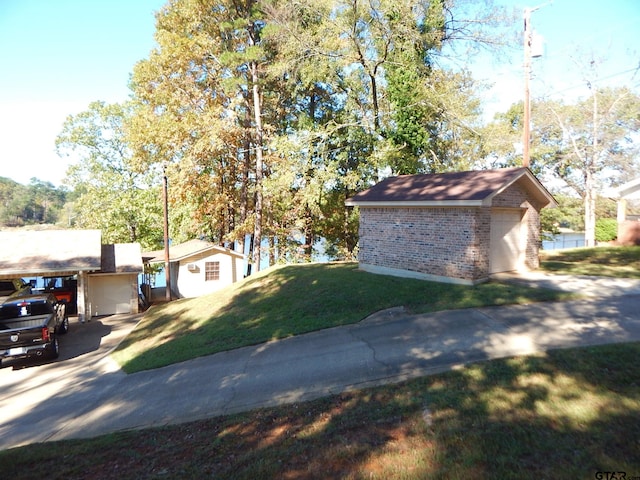 view of property exterior featuring a storage shed and a yard