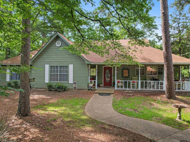 184 Shiprock Path, Holly Lake Ranch, TX 75765 - view of front facade with a porch