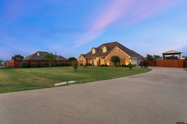 16050 Stonebriar Ct, Lindale, TX 75771 - view of front facade with brick siding, concrete driveway, a garage, and a gazebo