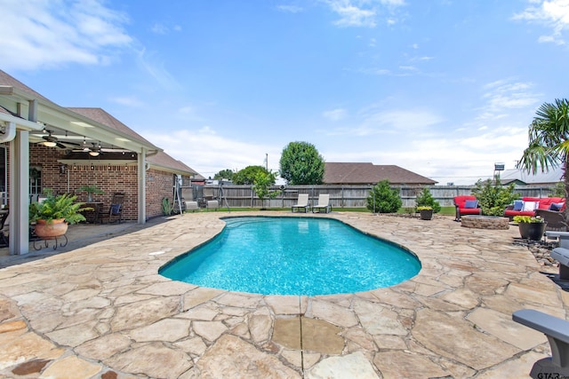 16050 Stonebriar Ct, Lindale, TX 75771 - view of swimming pool featuring a patio area, a ceiling fan, a fenced backyard, and a fire pit