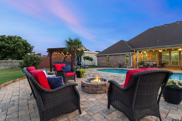 16050 Stonebriar Ct, Lindale, TX 75771 - patio terrace at dusk with an outdoor fire pit, a patio area, and a pergola