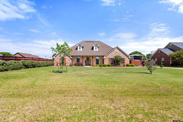 16050 Stonebriar Ct, Lindale, TX 75771 - cape cod home featuring brick siding