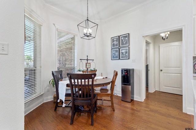 16050 Stonebriar Ct, Lindale, TX 75771 - dining space with a chandelier, wood finished floors, and ornamental molding