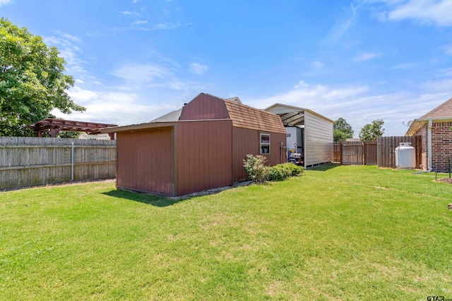 16050 Stonebriar Ct, Lindale, TX 75771 - fenced backyard with a storage unit