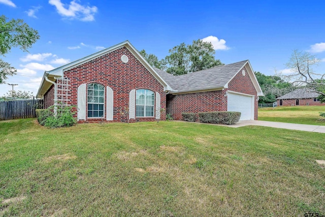 view of front of house with a front lawn and a garage