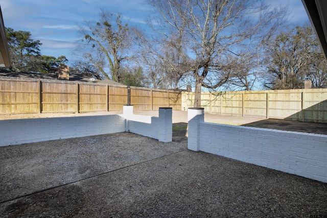 411 W Heritage Dr, Tyler, TX 75703 - fenced backyard with a patio