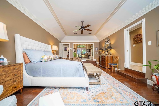 273 Fm 2276, Kilgore, TX 75662 - bedroom featuring crown molding, baseboards, a raised ceiling, and hardwood / wood-style floors