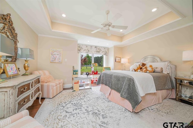 273 Fm 2276, Kilgore, TX 75662 - bedroom with crown molding, a tray ceiling, and wood finished floors