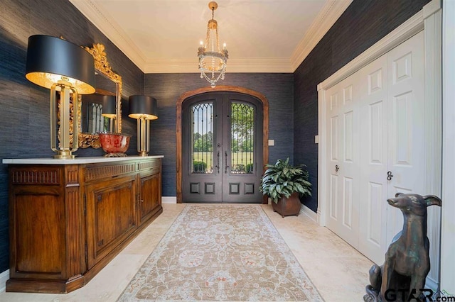 273 Fm 2276, Kilgore, TX 75662 - entrance foyer with french doors, baseboards, crown molding, and a chandelier