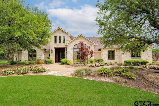 273 Fm 2276, Kilgore, TX 75662 - view of front facade featuring a front yard and stone siding