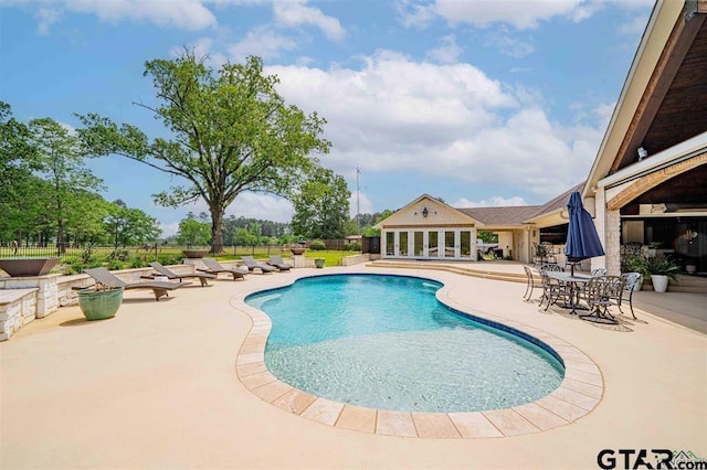 273 Fm 2276, Kilgore, TX 75662 - outdoor pool with fence, french doors, and a patio area