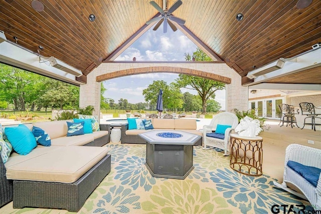 273 Fm 2276, Kilgore, TX 75662 - view of patio featuring a ceiling fan and an outdoor living space with a fire pit