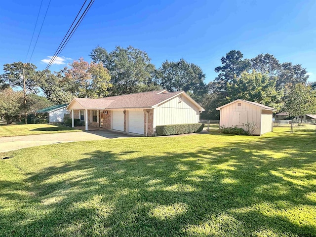 view of front of home with a garage and a front lawn