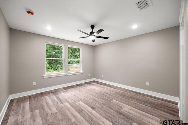 437 Tara Ln, Troup, TX 75789 - empty room with ceiling fan, wood finished floors, and recessed lighting