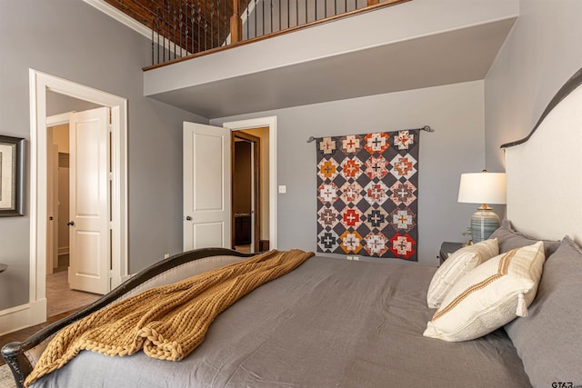 bedroom with a high ceiling