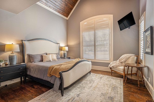 bedroom featuring hardwood / wood-style floors, lofted ceiling, ornamental molding, and wood ceiling