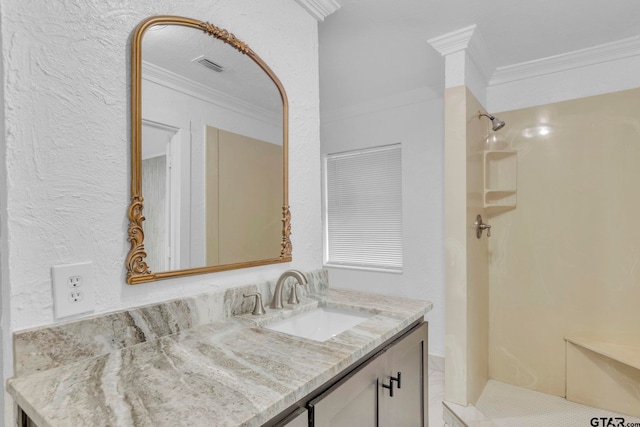 bathroom featuring vanity, walk in shower, and ornamental molding