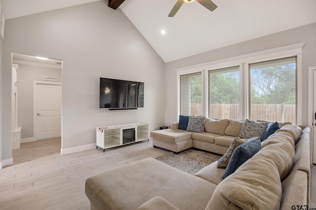 living room featuring beam ceiling, ceiling fan, high vaulted ceiling, and light wood-type flooring