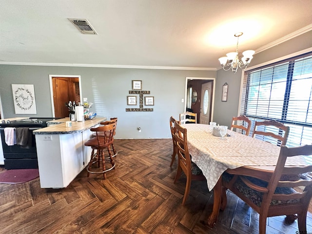 dining space with an inviting chandelier, dark parquet flooring, and crown molding