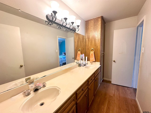 bathroom featuring vanity and hardwood / wood-style floors