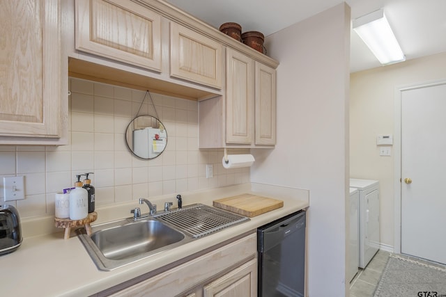 kitchen featuring light brown cabinetry, sink, tasteful backsplash, separate washer and dryer, and black dishwasher