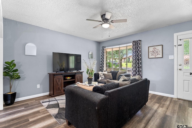 412 W 25th St, Tyler, TX 75702 - living area with a ceiling fan, wood finished floors, and a textured ceiling