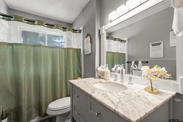 412 W 25th St, Tyler, TX 75702 - bathroom with vanity, a textured ceiling, and a shower with shower curtain