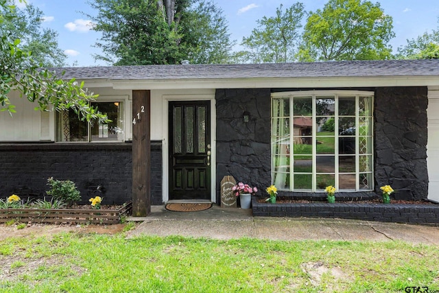 412 W 25th St, Tyler, TX 75702 - entrance to property with stone siding