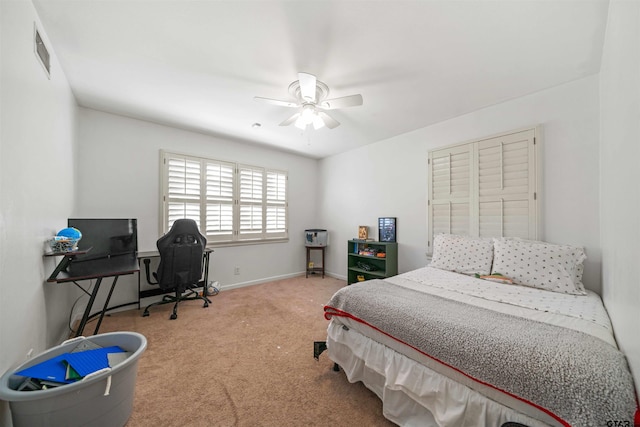 bedroom featuring ceiling fan and carpet floors