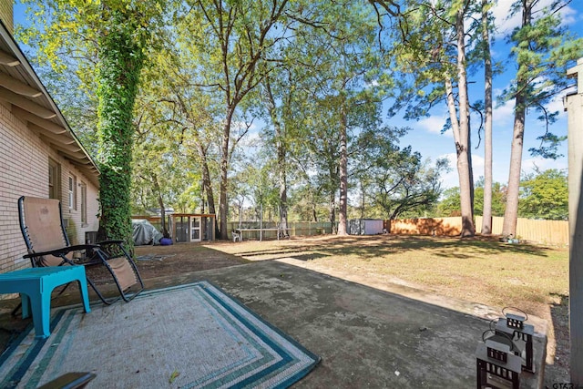 exterior space featuring a patio and a trampoline