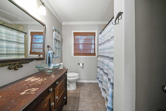 bathroom with vanity, a shower with curtain, crown molding, tile patterned flooring, and toilet