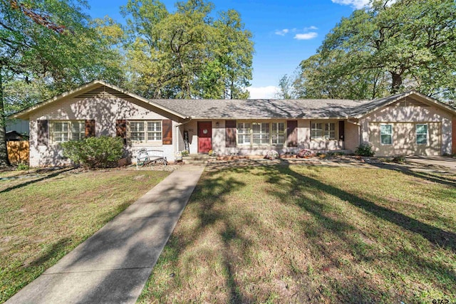 ranch-style house with a front yard