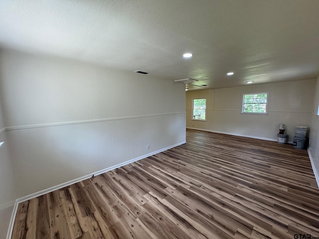 320 Northcrest Dr, Tyler, TX 75702 - unfurnished room with wood finished floors, recessed lighting, and a textured ceiling