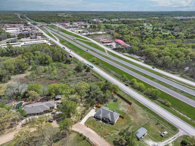 bird's eye view featuring a forest view