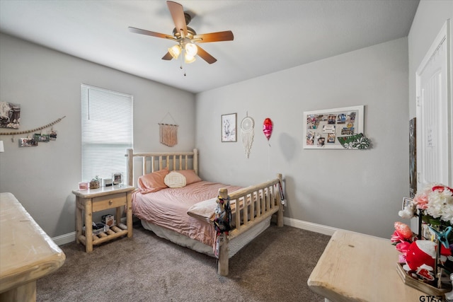 bedroom featuring a ceiling fan, carpet floors, and baseboards