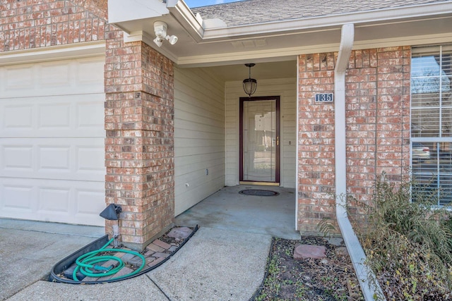 property entrance featuring a garage