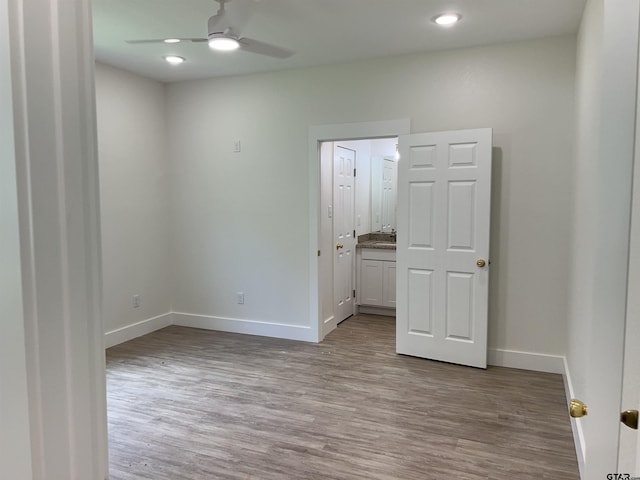 180 Lovers Ln, Alto, TX 75925 - spare room featuring ceiling fan, wood finished floors, and recessed lighting