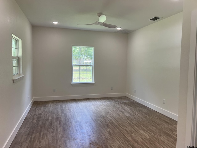 180 Lovers Ln, Alto, TX 75925 - spare room featuring a ceiling fan, dark wood-style flooring, and recessed lighting