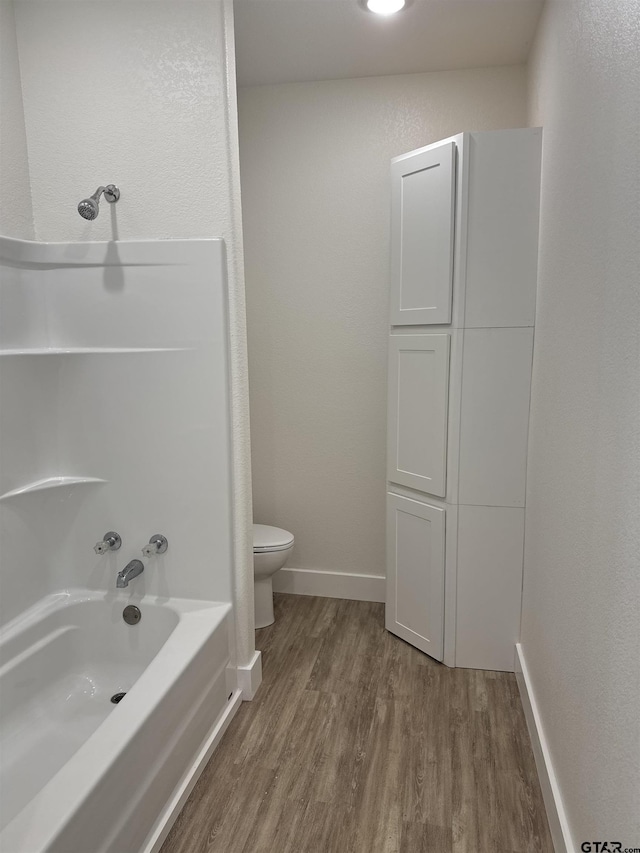 180 Lovers Ln, Alto, TX 75925 - bathroom with wood finished floors and bathtub / shower combination