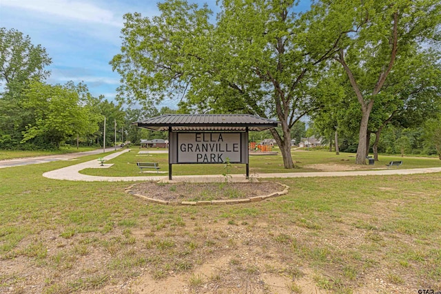 316 Polk St, Gilmer, TX 75644 - community / neighborhood sign featuring a lawn