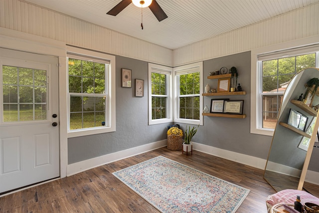 316 Polk St, Gilmer, TX 75644 - interior space with ceiling fan, a wealth of natural light, and wood finished floors
