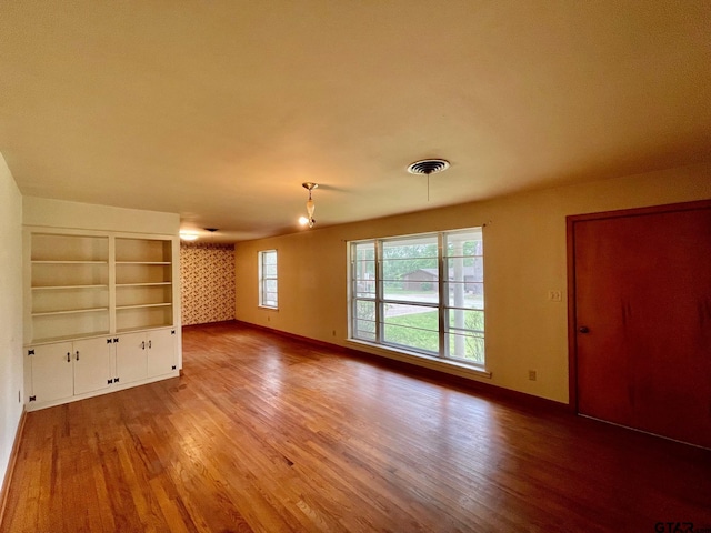 interior space with hardwood / wood-style floors