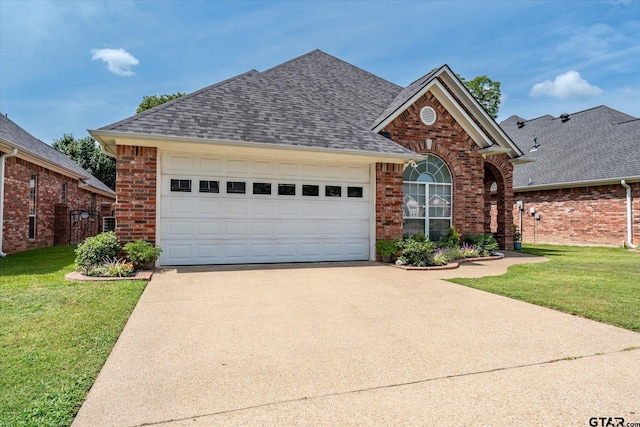 3109 Granbury Ct, Tyler, TX 75707 - traditional home featuring brick siding, a shingled roof, concrete driveway, and an attached garage