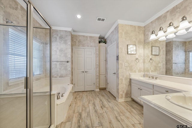 3109 Granbury Ct, Tyler, TX 75707 - bathroom featuring vanity, crown molding, a garden tub, wood finished floors, and an enclosed shower